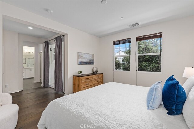 78 Patria, Rancho Mission Viejo, CA 92694 - bedroom with dark wood finished floors, recessed lighting, and ensuite bathroom
