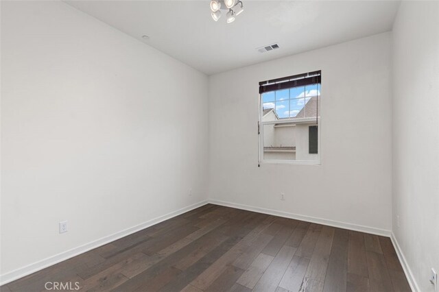 78 Patria, Rancho Mission Viejo, CA 92694 - spare room featuring dark wood-style flooring and baseboards