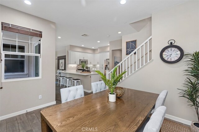 78 Patria, Rancho Mission Viejo, CA 92694 - dining room with wood finished floors, stairs, and recessed lighting