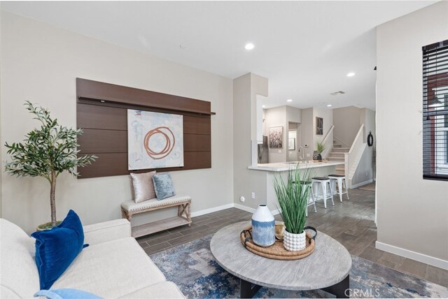 78 Patria, Rancho Mission Viejo, CA 92694 - living room with stairs, wood finished floors, and recessed lighting