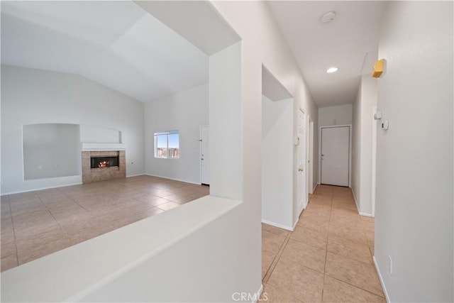 26577 Trumble Rd, Menifee, CA 92585 - corridor with light tile patterned flooring and lofted ceiling