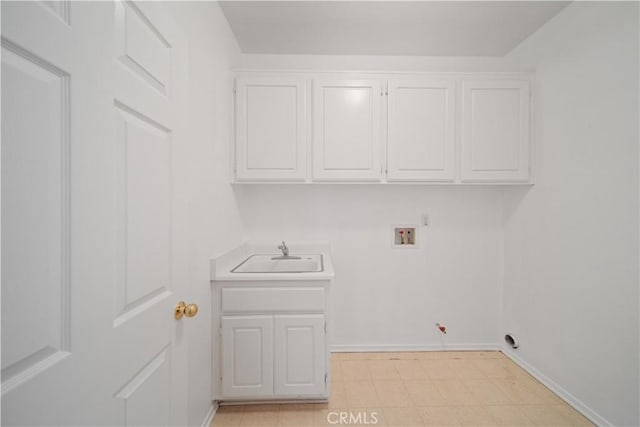 26577 Trumble Rd, Menifee, CA 92585 - laundry room with gas dryer hookup, washer hookup, cabinet space, and light floors
