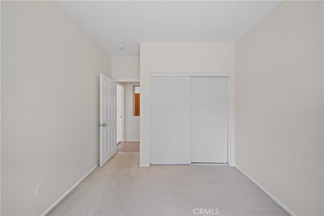 26577 Trumble Rd, Menifee, CA 92585 - unfurnished bedroom featuring carpet flooring and a closet