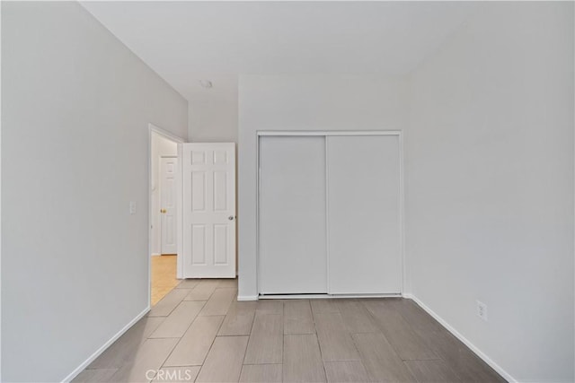 26577 Trumble Rd, Menifee, CA 92585 - unfurnished bedroom with a closet and baseboards