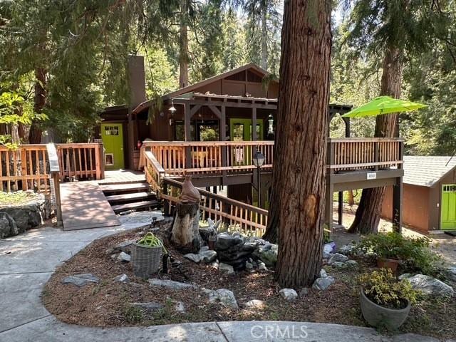 41141 Oak Dr, Forest Falls, CA 92339 - view of front of house with a wooden deck