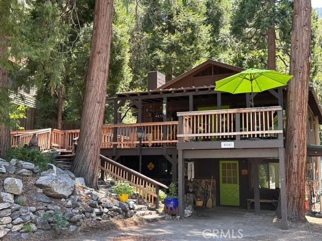 41141 Oak Dr, Forest Falls, CA 92339 - view of front of property with a chimney and a deck