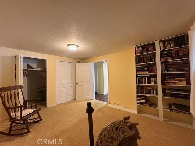 41141 Oak Dr, Forest Falls, CA 92339 - sitting room featuring carpet floors and baseboards