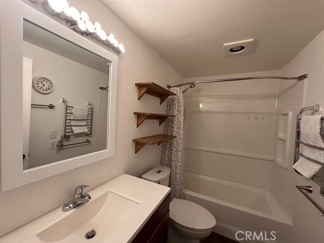 41141 Oak Dr, Forest Falls, CA 92339 - full bathroom with vanity, shower / bath combination with curtain, and toilet