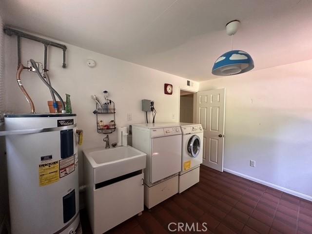 41141 Oak Dr, Forest Falls, CA 92339 - laundry area featuring electric water heater and washer and dryer