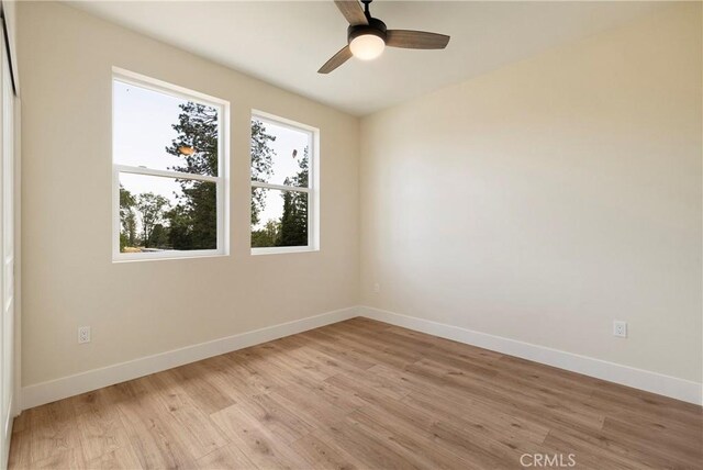 2395 Tokay Ct, Paradise, CA 95969 - empty room featuring light wood-type flooring, baseboards, and ceiling fan