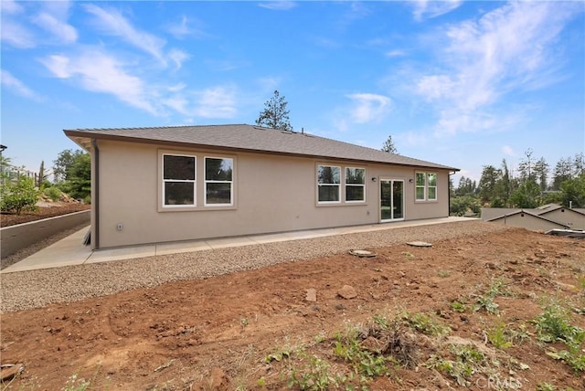 2395 Tokay Ct, Paradise, CA 95969 - back of house featuring stucco siding and a patio