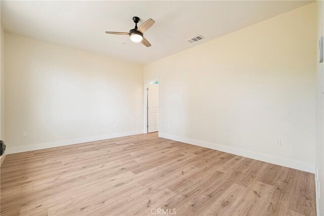 2395 Tokay Ct, Paradise, CA 95969 - unfurnished room featuring light wood-style flooring, baseboards, and a ceiling fan