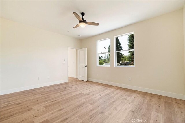 2395 Tokay Ct, Paradise, CA 95969 - spare room featuring light wood finished floors, baseboards, and ceiling fan