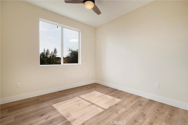 2395 Tokay Ct, Paradise, CA 95969 - spare room featuring baseboards and light wood-type flooring