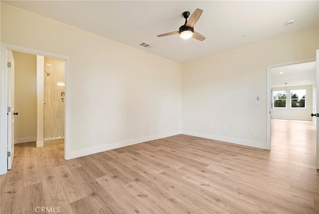 2395 Tokay Ct, Paradise, CA 95969 - unfurnished room featuring light wood finished floors, a ceiling fan, and baseboards