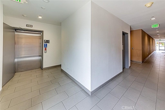 4813 Oakwood Ave Unit 201, Los Angeles, CA 90004 - hallway with recessed lighting, light tile patterned flooring, and elevator