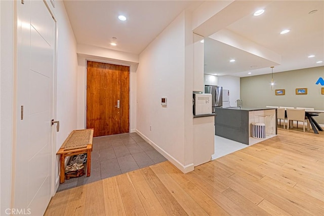 4813 Oakwood Ave Unit 201, Los Angeles, CA 90004 - entrance foyer with light wood-style flooring and recessed lighting