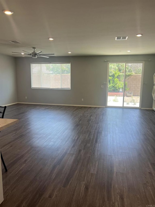 32323 Roman Warren Way, Winchester, CA 92596 - spare room featuring baseboards, plenty of natural light, dark wood-style flooring, ceiling fan, and recessed lighting