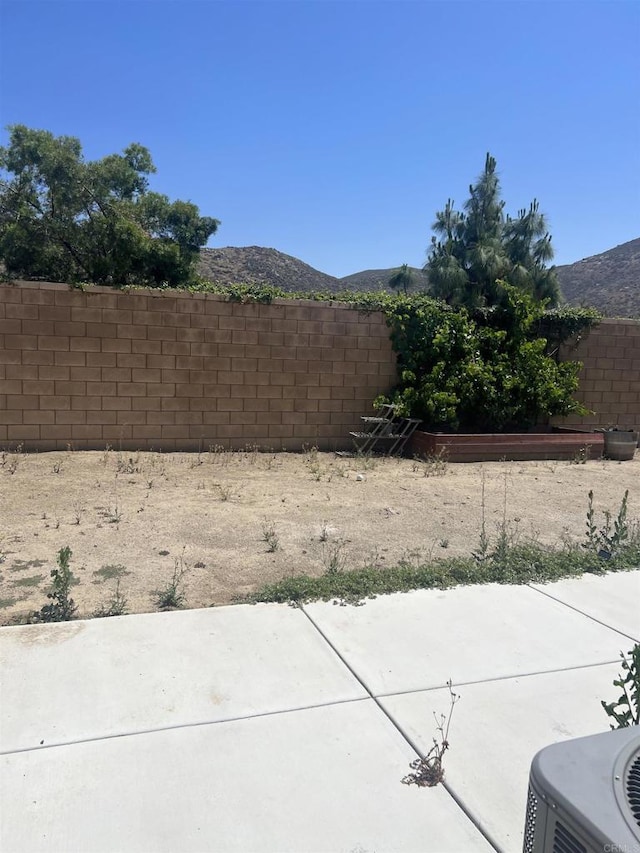32323 Roman Warren Way, Winchester, CA 92596 - view of patio featuring a mountain view