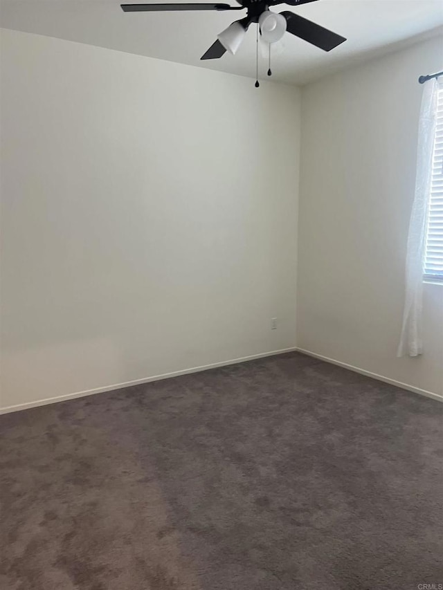 32323 Roman Warren Way, Winchester, CA 92596 - spare room with ceiling fan, dark colored carpet, and baseboards