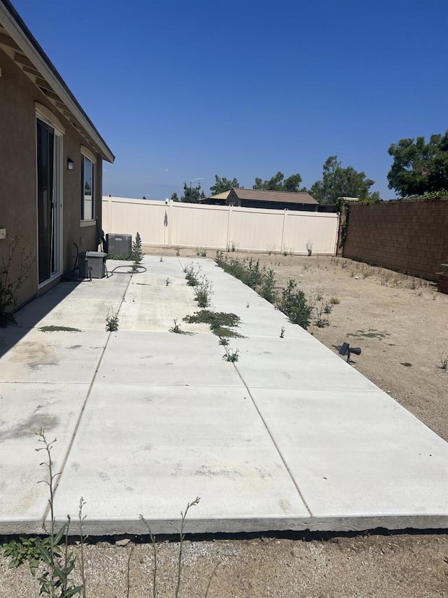 32323 Roman Warren Way, Winchester, CA 92596 - fenced backyard featuring a patio area