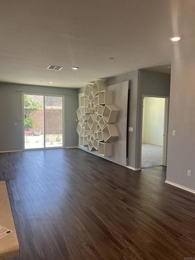 32323 Roman Warren Way, Winchester, CA 92596 - unfurnished room featuring dark wood-style flooring, baseboards, and recessed lighting