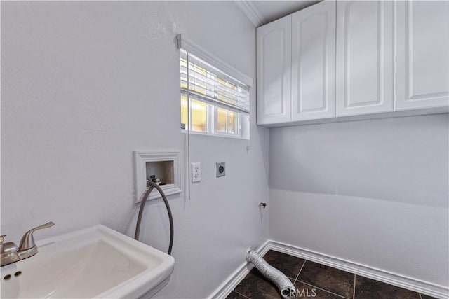 5071 Bushnell Ave, Riverside, CA 92505 - washroom with cabinet space, hookup for an electric dryer, washer hookup, and tile patterned flooring