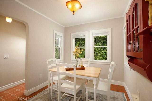 1321 Virginia Ave, Glendale, CA 91202 - dining space with baseboards, ornamental molding, and tile patterned flooring
