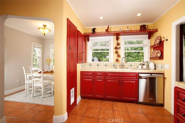1321 Virginia Ave, Glendale, CA 91202 - kitchen with dishwasher, a sink, plenty of natural light, ornamental molding, and arched walkways