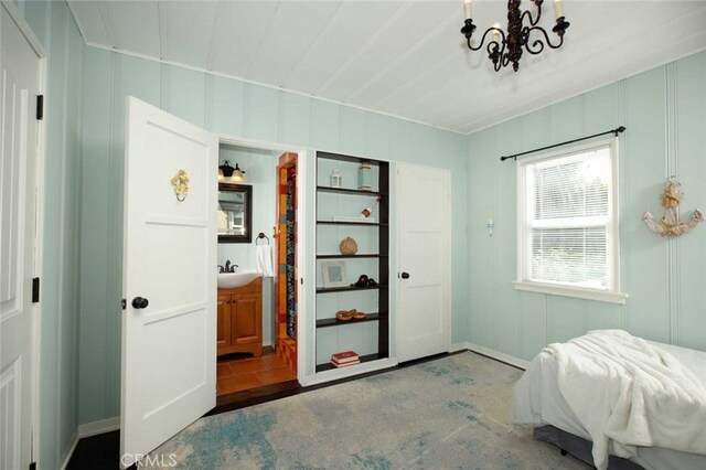 1321 Virginia Ave, Glendale, CA 91202 - bedroom featuring a chandelier, a sink, and a decorative wall