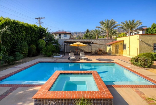 1321 Virginia Ave, Glendale, CA 91202 - view of swimming pool with a patio, a pergola, and a pool with connected hot tub
