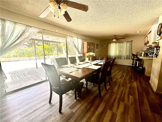 3346 Sunnyside Dr, Riverside, CA 92506 - dining space with a ceiling fan, a textured ceiling, dark wood-style floors, and baseboards