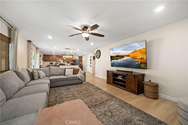 29377 Wyatt Earp Way, Winchester, CA 92596 - living area with ceiling fan, light wood-type flooring, baseboards, and recessed lighting