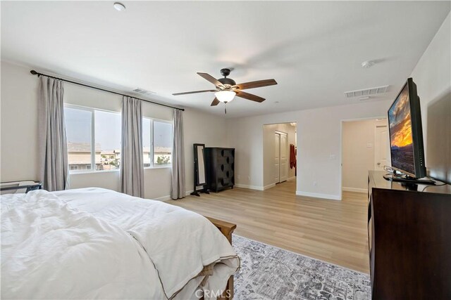 29377 Wyatt Earp Way, Winchester, CA 92596 - bedroom featuring light wood finished floors, baseboards, and a ceiling fan