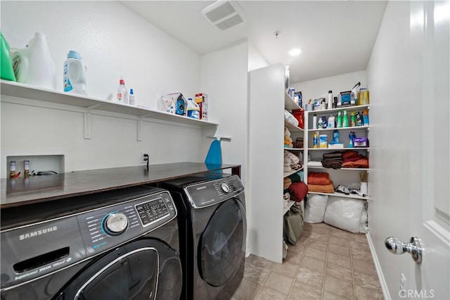 29377 Wyatt Earp Way, Winchester, CA 92596 - washroom featuring washing machine and dryer and stone finish floors