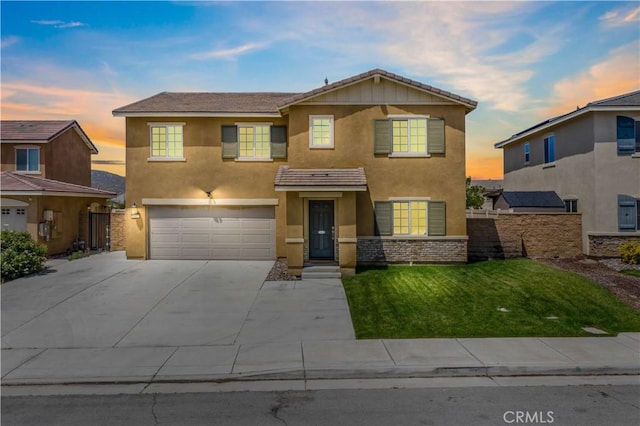 29377 Wyatt Earp Way, Winchester, CA 92596 - view of front of home featuring stucco siding, a garage, and concrete driveway