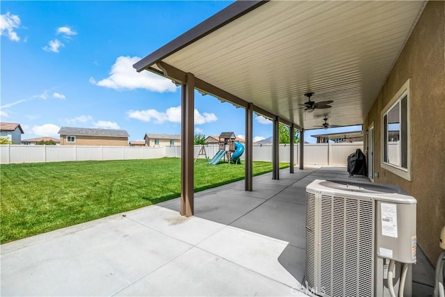 29377 Wyatt Earp Way, Winchester, CA 92596 - view of patio with central AC unit, a playground, and a ceiling fan
