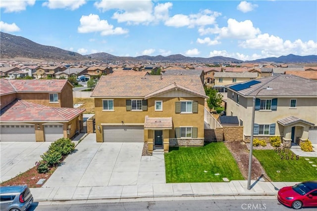 29377 Wyatt Earp Way, Winchester, CA 92596 - view of front facade with a residential view, driveway, stucco siding, and a mountain view