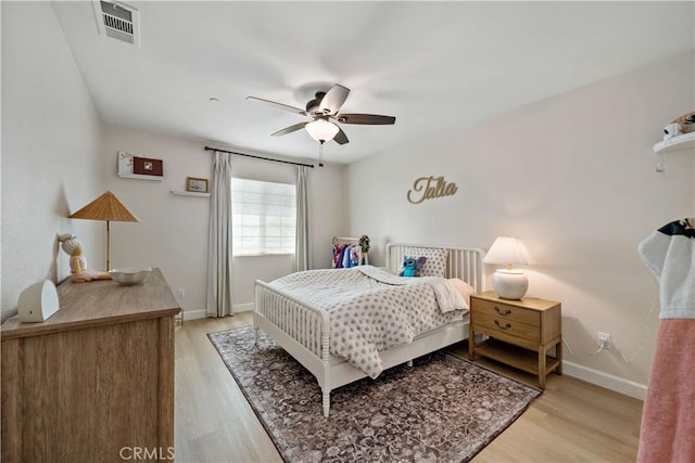 29377 Wyatt Earp Way, Winchester, CA 92596 - bedroom featuring light wood-style flooring, baseboards, and a ceiling fan