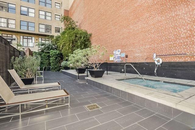 460 S Spring St Unit 613, Los Angeles, CA 90013 - view of pool with a community hot tub and a patio
