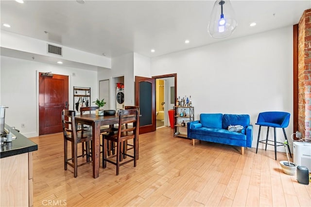 460 S Spring St Unit 613, Los Angeles, CA 90013 - dining room featuring light wood-style floors, recessed lighting, and washer / clothes dryer