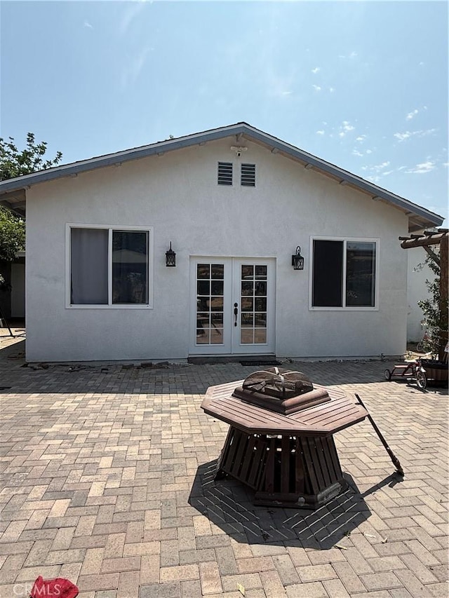 6867 Weaver St, Riverside, CA 92504 - back of house featuring a patio area, french doors, and stucco siding