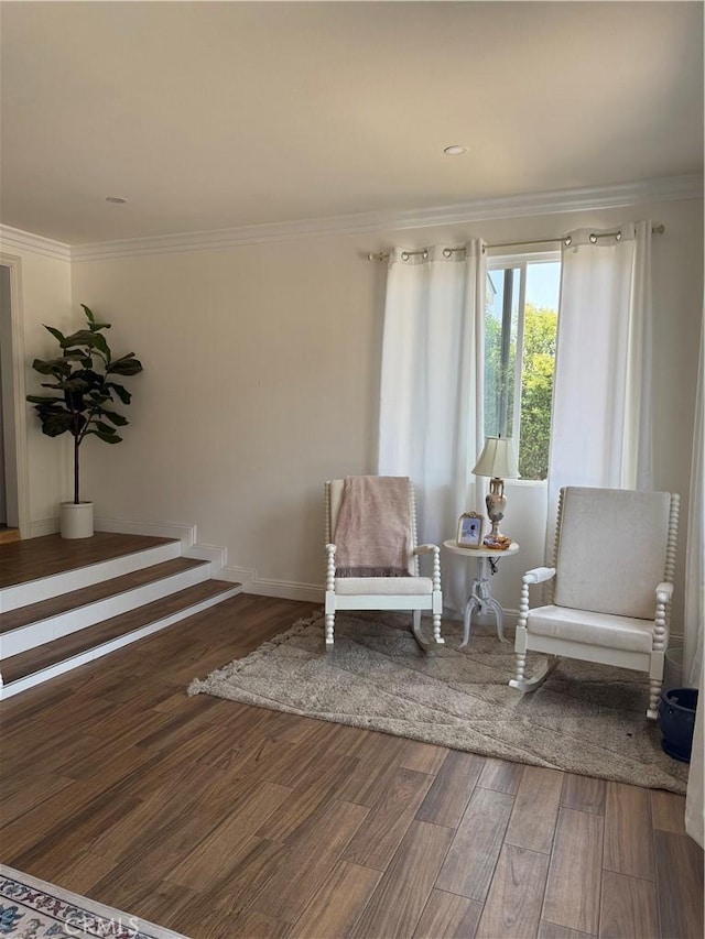 6867 Weaver St, Riverside, CA 92504 - sitting room featuring wood finished floors, crown molding, and baseboards