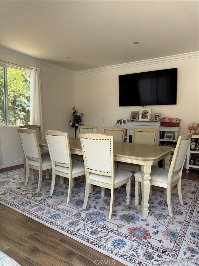 6867 Weaver St, Riverside, CA 92504 - dining area featuring wood finished floors and crown molding