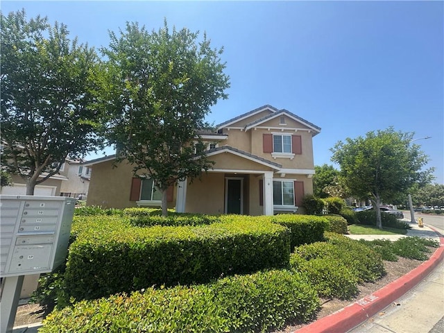 9757 Edenbrook Dr, Riverside, CA 92503 - view of front facade with stucco siding