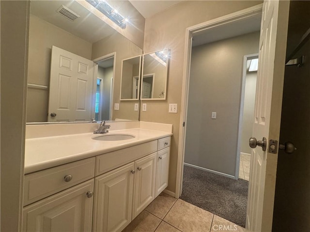 9757 Edenbrook Dr, Riverside, CA 92503 - bathroom featuring vanity, tile patterned floors, and baseboards
