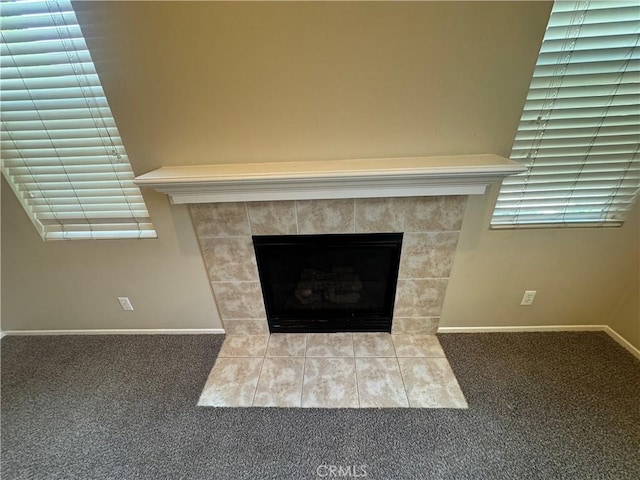 9757 Edenbrook Dr, Riverside, CA 92503 - detailed view of carpet flooring, baseboards, and a tile fireplace