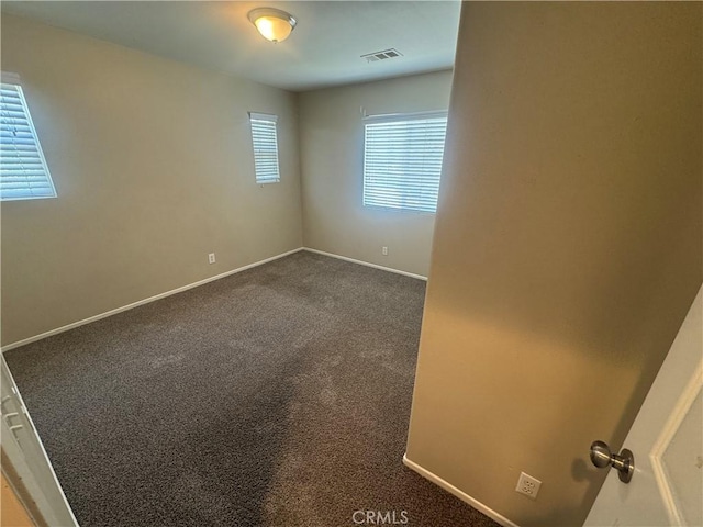 9757 Edenbrook Dr, Riverside, CA 92503 - carpeted spare room with baseboards