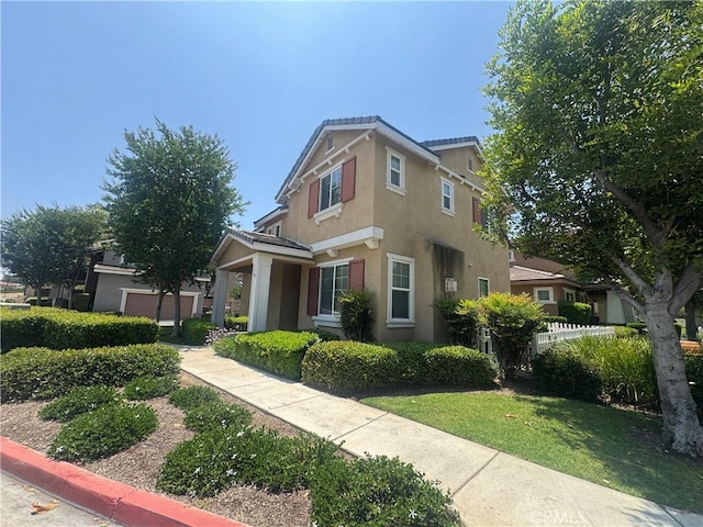 9757 Edenbrook Dr, Riverside, CA 92503 - view of front of house with stucco siding and a garage