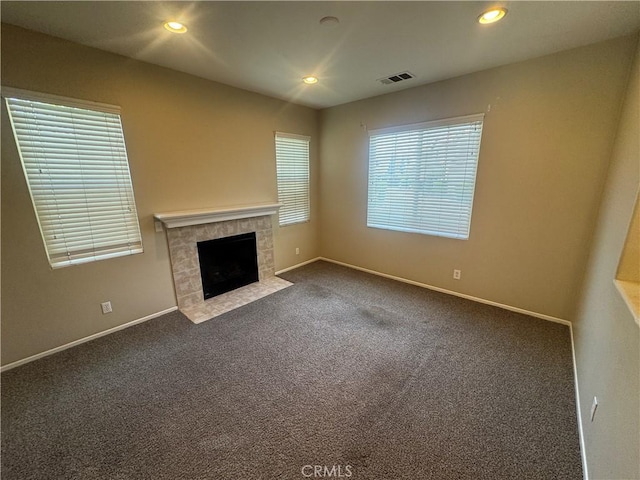 9757 Edenbrook Dr, Riverside, CA 92503 - unfurnished living room with a fireplace, healthy amount of natural light, carpet floors, baseboards, and recessed lighting
